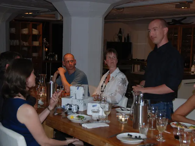 Students sell snacks from glass and steel kiosks, instead of the traditional supermarket setup, on...