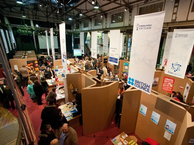 In this image we can see few persons are standing on the carpet on the floor and there are papers,...